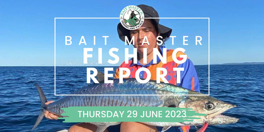 Boy holding a Spanish Mackerel